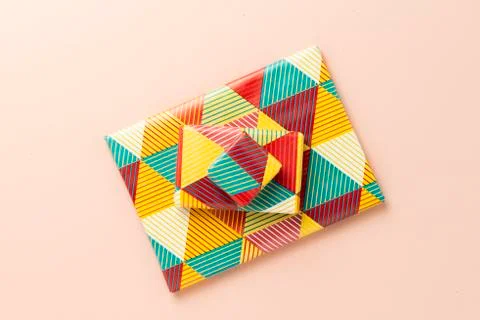 Gift on pink background. Stock Photos