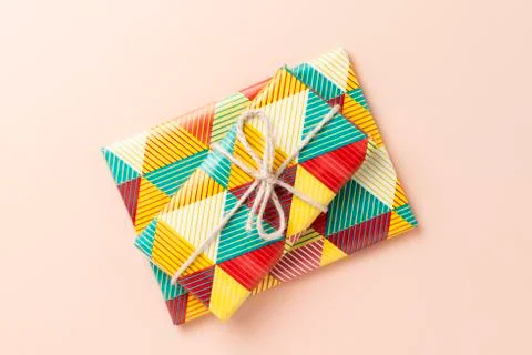 Gift on pink background. Stock Photos