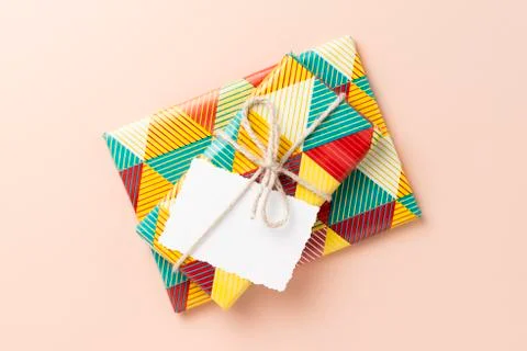 Gift on pink background. Stock Photos
