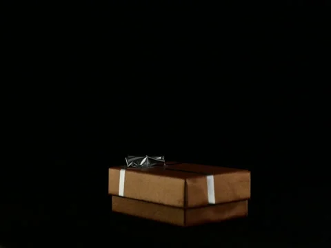 Gift present box on black background Stock Footage 70486124