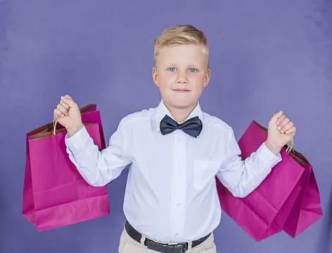 Gift present copy space holds red packages in her hands color of the year 2022 Stock Photos