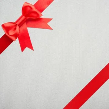 Gift with red bow Stock Photos