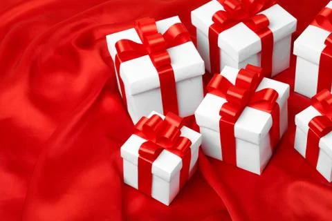 Gift on red satin background Stock Photos