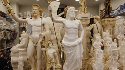 Gift shop interior. Miniature figures of ancient gods and ancient objects. Stock Footage 124477211
