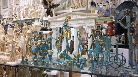 Gift shop interior. Miniature figures of ancient gods and ancient objects. Stock Footage 125549900