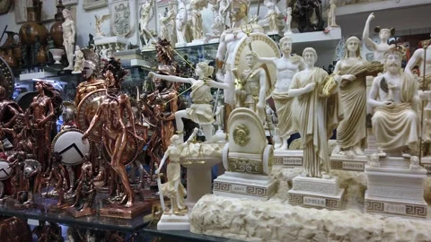 Gift shop interior. Miniature figures of ancient gods and ancient objects. Stock Footage 136949569
