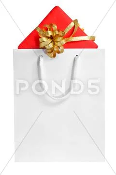 Gift in a shopping bag Stock Photos