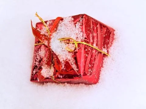 Gift in Snow Stock Photos