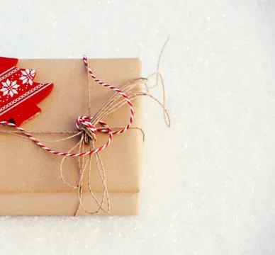 Gift on snow Stock Photos