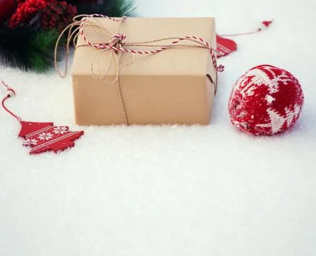 Gift on snow Stock Photos