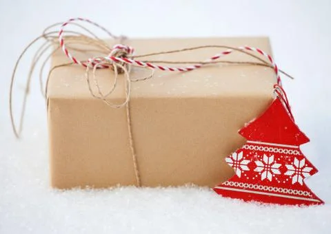 Gift on snow Stock Photos