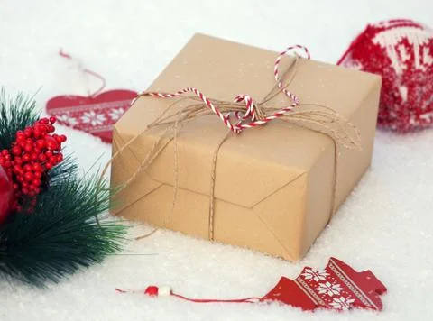 Gift on snow Stock Photos