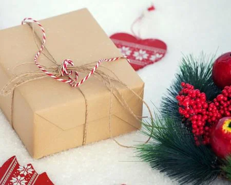 Gift on snow Stock Photos