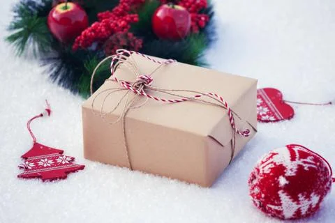 Gift on snow Stock Photos