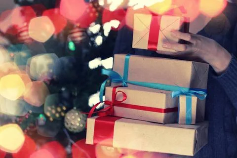 Gift stack hand christmas New Year s Eve celebration package gifts and sig... 스톡 사진