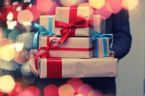 Gift stack hand christmas New Year s Eve celebration package gifts and sig... Stockfoto's