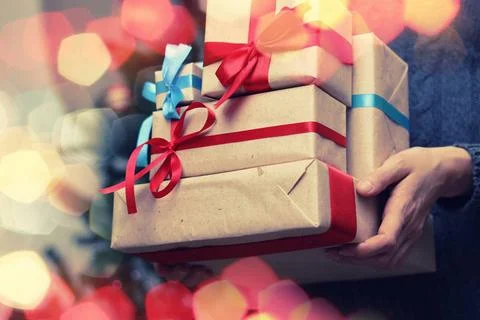 Gift stack hand christmas New Year s Eve celebration package gifts and sig... 스톡 사진