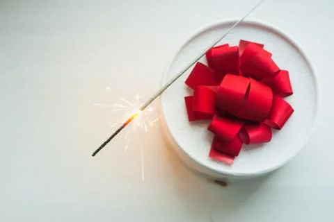 The gift on the table, Sparkler, Foto stock