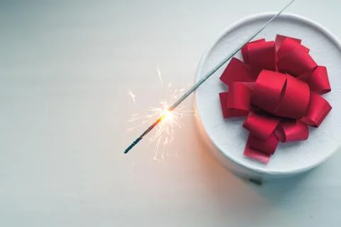 The gift on the table, Sparkler, Foto stock