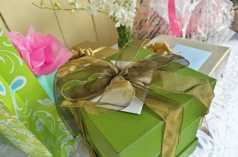 A Gift Table Stacked with Elegantly Wrapped Gifts and Presents Stock Photos