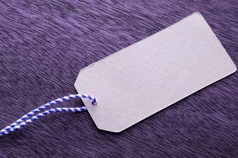 Gift tag on a string Stock Photos