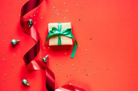 Gift. View from above with copy space. top view on a red background. Stock Photos