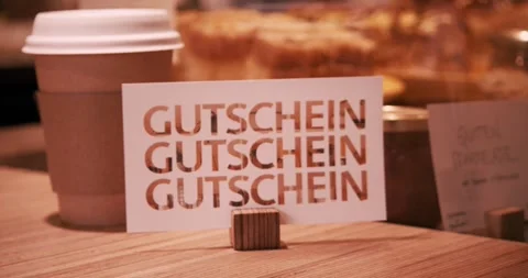 Gift Voucher On A Bakery Counter Close Up Pastries Stock-Footage 334113555