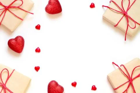 A gift on a white background with decorations. The concept of the St. Valenti Stock Photos