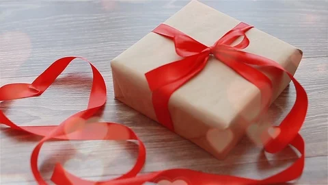 A gift for a woman is on the table Stock Footage 102821751