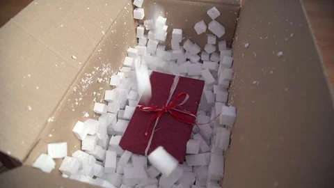 Gift wrap in box for shipment Video stock 74739422