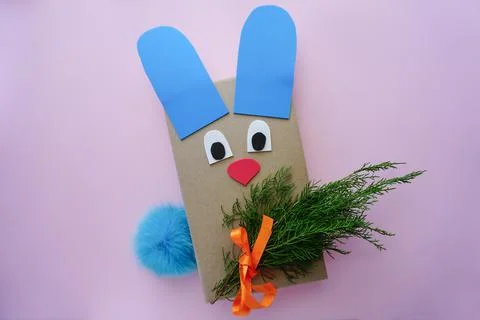 Gift wrapping in the form of a rabbit. Stock Photos
