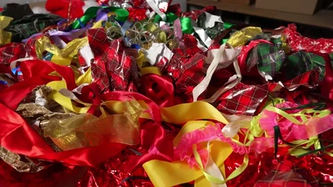 Gift wrapping paper and Old or Broken Christmas Lights Stock Footage 324614442