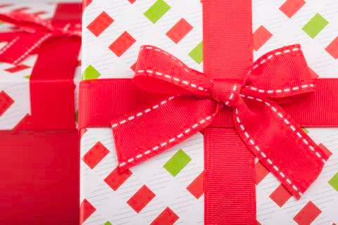 Gift wrapping with a red bow Stock Photos