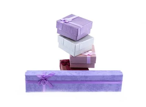 Giftbox stack of gifts long and square on isolated background pastel colors Stockfoto's