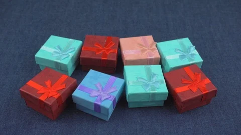 Gifts boxes on a jeans background Stock Footage 102914613