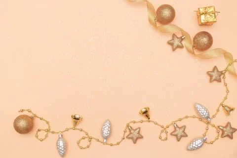 Gifts boxes or presents boxes with golden bows, star and ball on golden backg Stock Photos