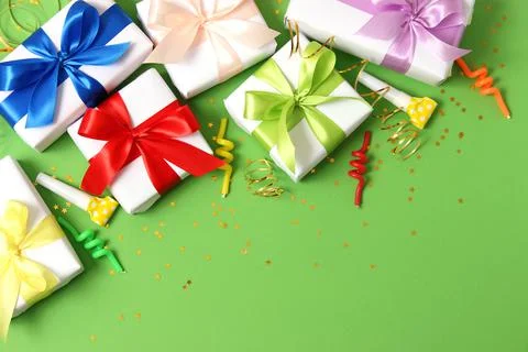 Gifts on a colored background. Holiday, giving presents, birthday. Stock Photos