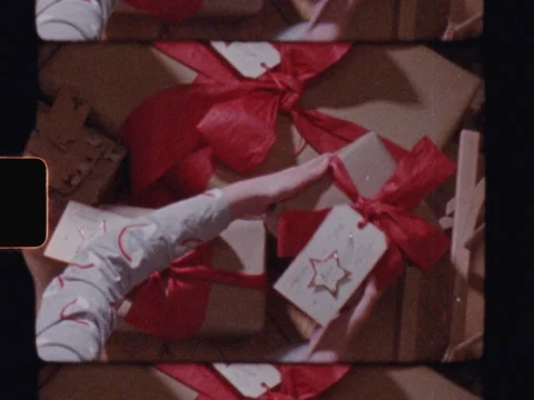 Gifts/Present stacked under the tree - Super 8 film (Christmas Day) Stock Footage 151262253