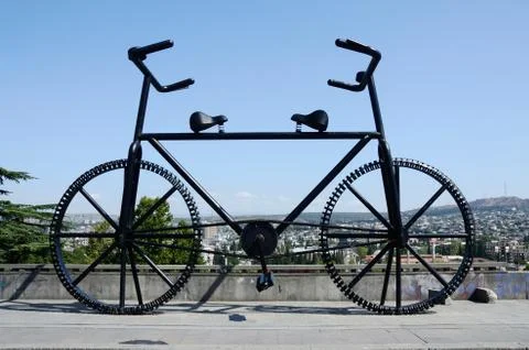 Gigantic bicycle statue with two handle bars and saddles, tbilisi, georgia Stock Photos