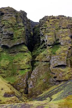 A gigantic chasm in a rock wall, located on the south side of the Snaefellsne Stock Photos