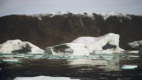 Gigantic Ice block structures on the black sand by the sea shore Stock Illustration