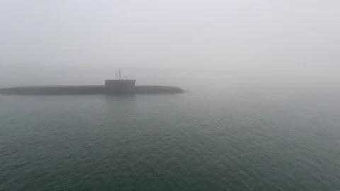 Gigantic russian navy Typhoon class atomic ballistic missile submarine floats Stock Footage 104076804