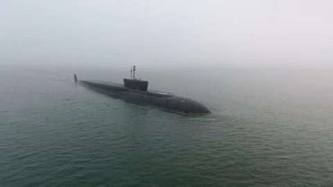 Gigantic russian navy Typhoon class atomic ballistic missile submarine floats Stock Footage 104077190