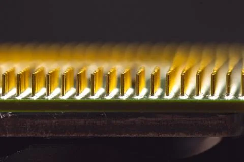 Gilded computer processor contacts. 스톡 사진