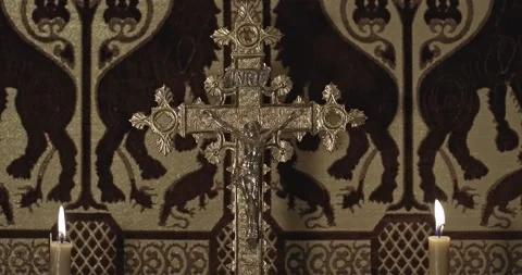 Gilded crucifix on a private medieval altar with flickering candles #1 Stock Footage 165520953