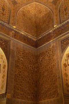 Gilded interior ceiling and walls of Gur-e-Amir mausoleum in Samarkand with.. Stock Photos