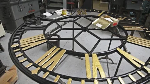 Gilded Iron Tower Clock Face in Horology Workshop Stock Footage 345749107