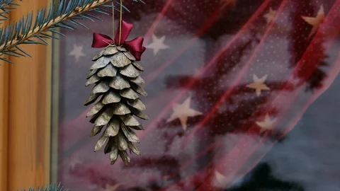 Gilded pine cone in Christmas tree 스톡 동영상 99685930