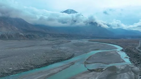 Gilgit covered with clouds in Pakistan. Aerial shot. Stock Footage 276808759