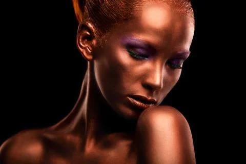 Gilt. Golden Woman's Face Closeup. Futuristic Gilded Make-up. Painted Skin Stock Photos